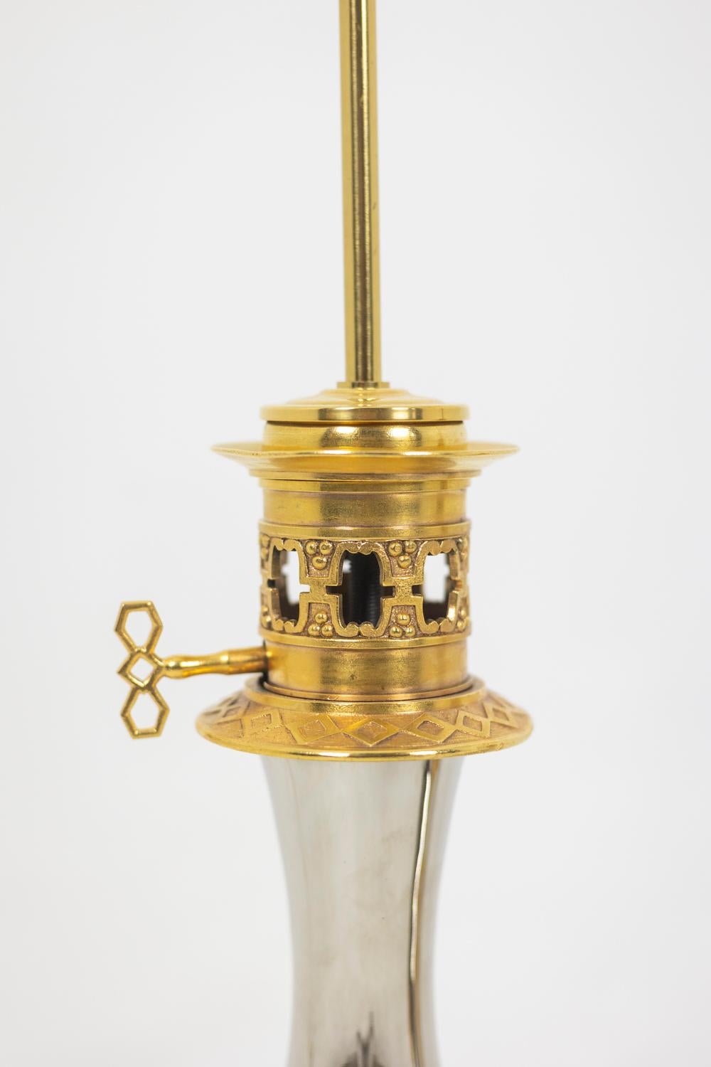 French Pair of lamps in metal and gilded bronze, circa 1880 For Sale