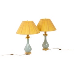 Paire de lampes en porcelaine de Cladon et bronze, vers 1880