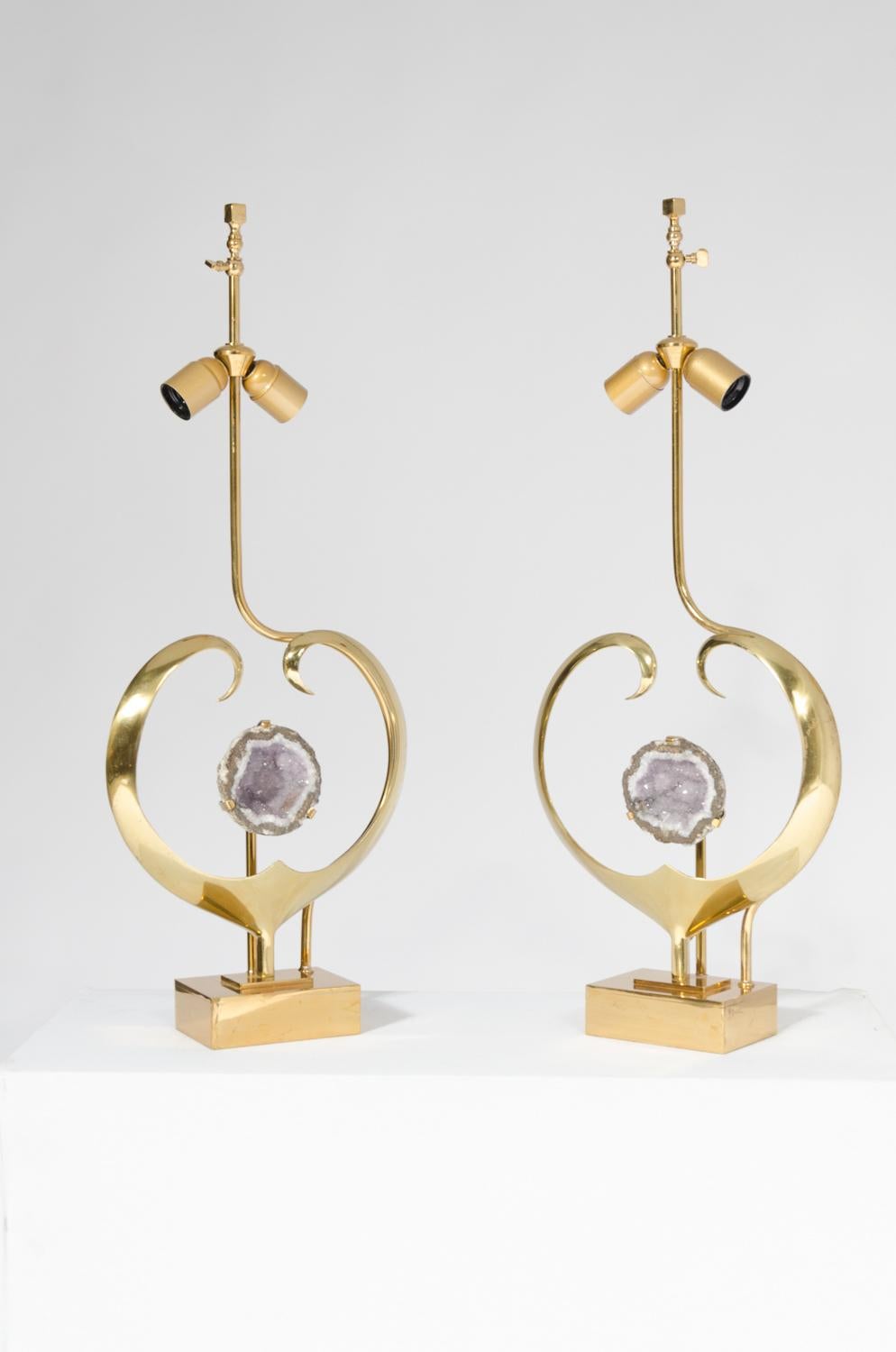 From the 1970s comes this pair of table lamps in sculptural heart brass and amethyst. The lamps received new electric al wires according to the latest safety standards and new polish. Signed by the artist.