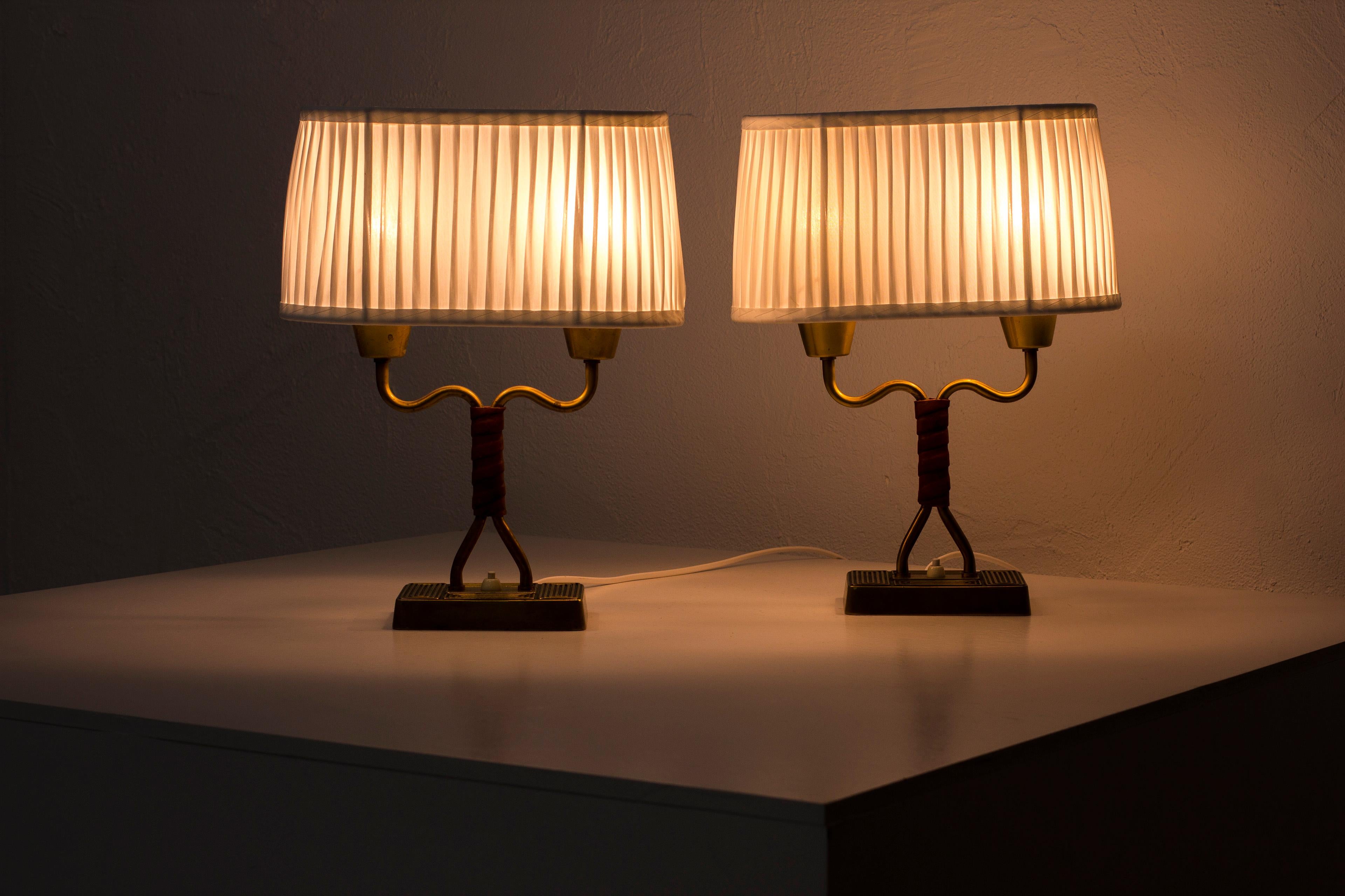Pair of Lamps with Cognac Leather by Sonja Katzin for ASEA, Sweden, 1950s 4