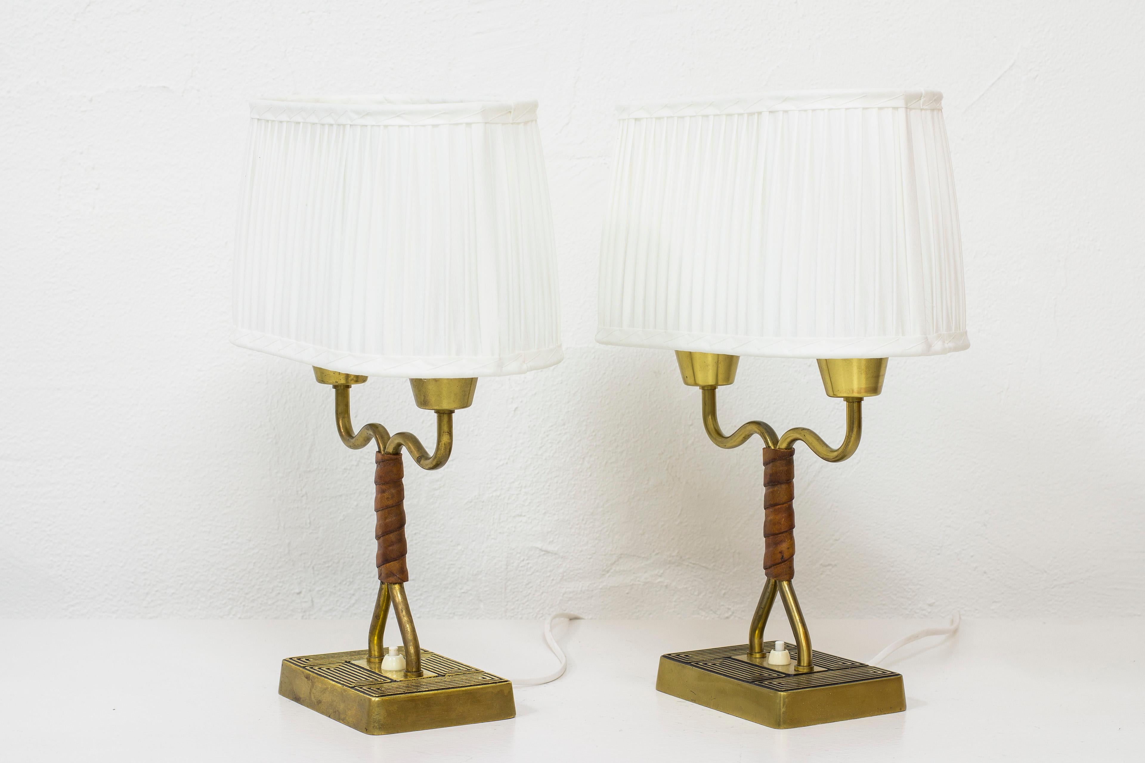 Mid-20th Century Pair of Lamps with Cognac Leather by Sonja Katzin for ASEA, Sweden, 1950s