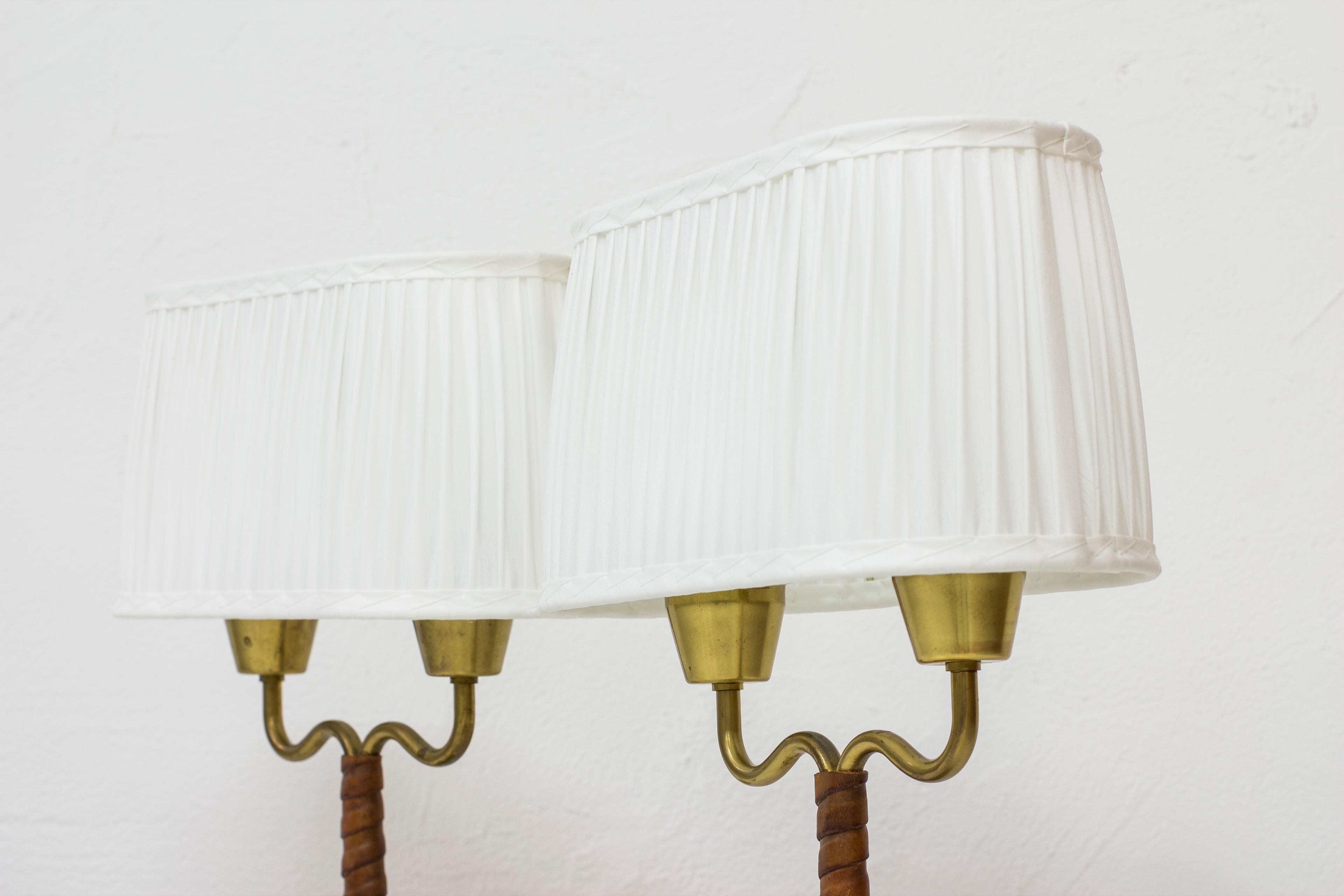 Brass Pair of Lamps with Cognac Leather by Sonja Katzin for ASEA, Sweden, 1950s