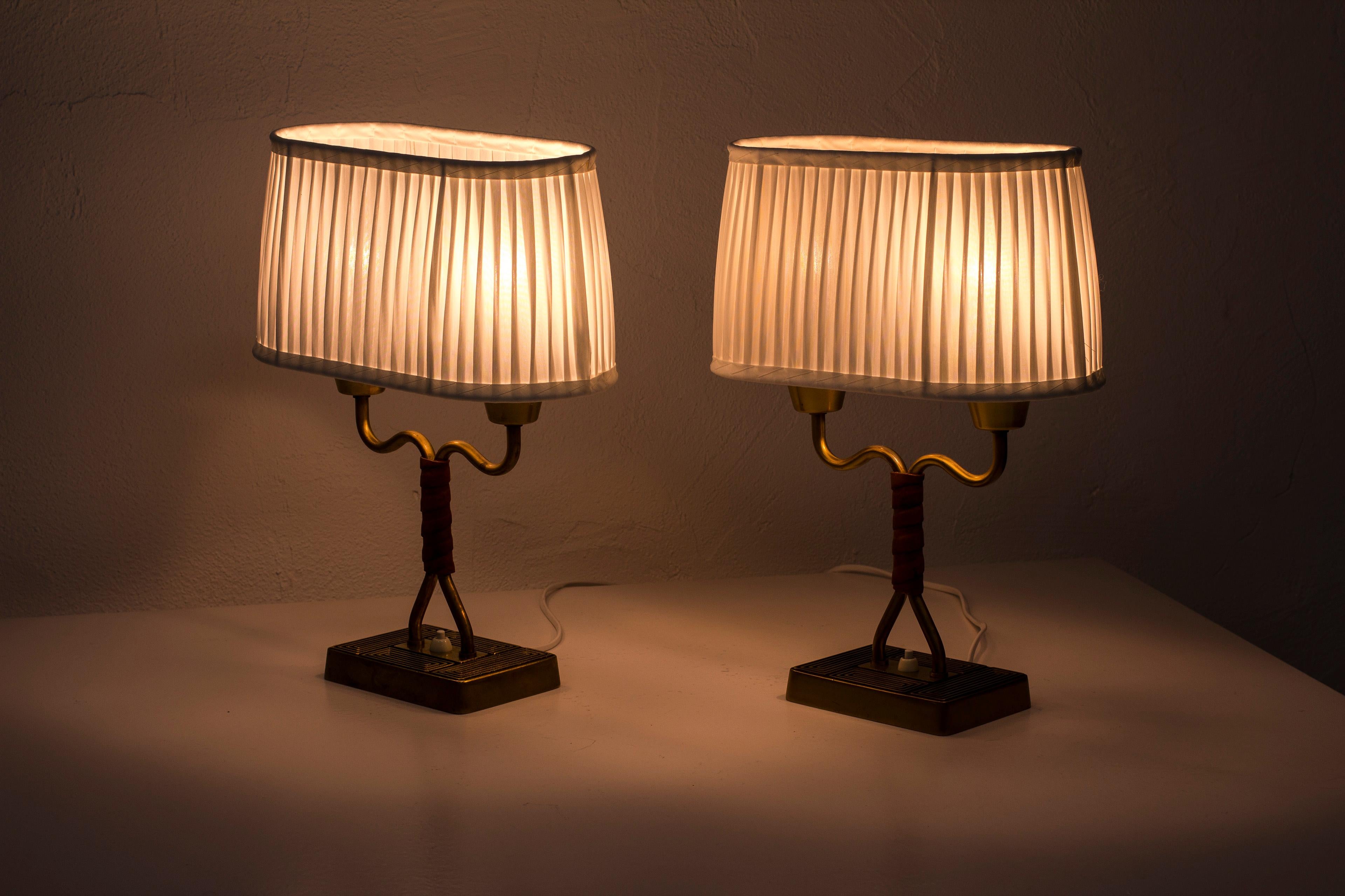 Pair of Lamps with Cognac Leather by Sonja Katzin for ASEA, Sweden, 1950s 1