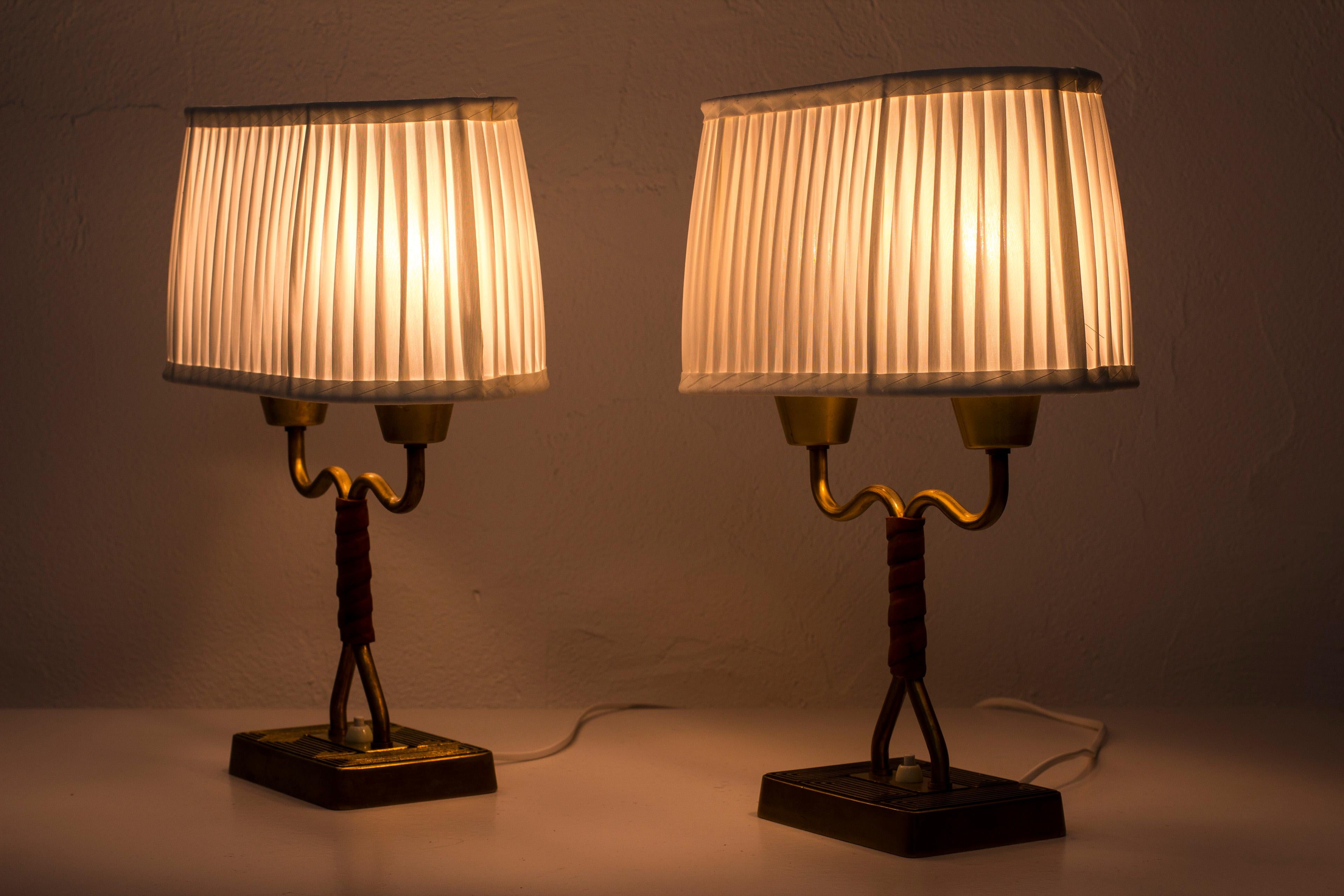 Pair of Lamps with Cognac Leather by Sonja Katzin for ASEA, Sweden, 1950s 3