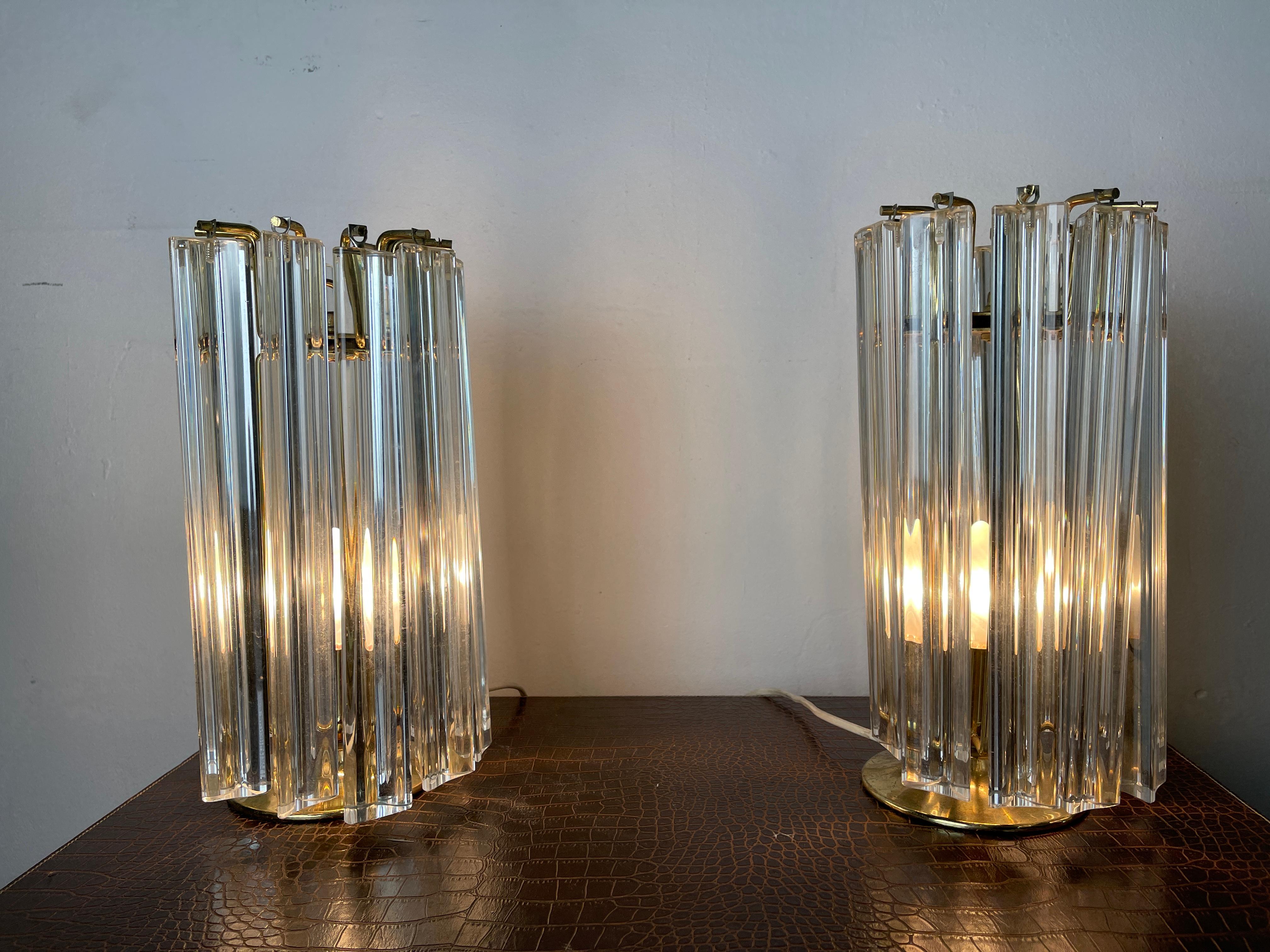 Pair of abat-jour in brass and trefoil glass typical of the Venetian production of the Venini company.