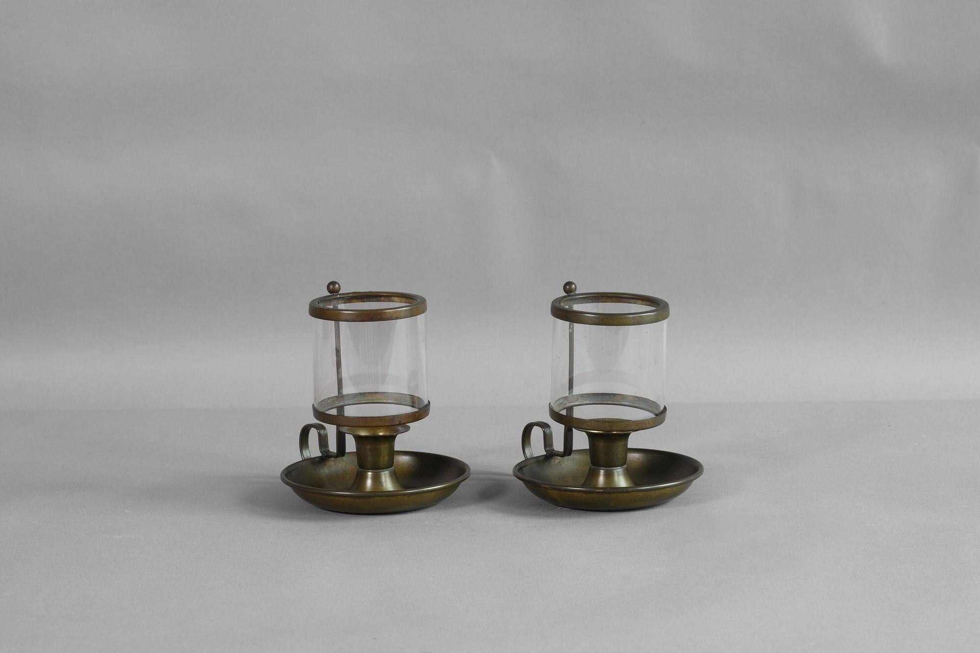 Pair of candle stands with glass shades.
U.K circa 1900.
H 15cm x W 17cm x D 13cm
Please be in touch for an accurate shipping quote.