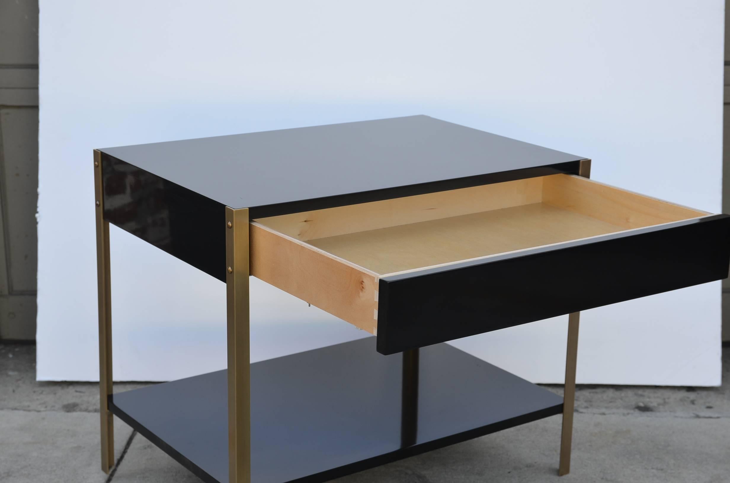 Brushed Pair of 'Laque' Black Lacquer and Brass Nightstands by Design Frères For Sale