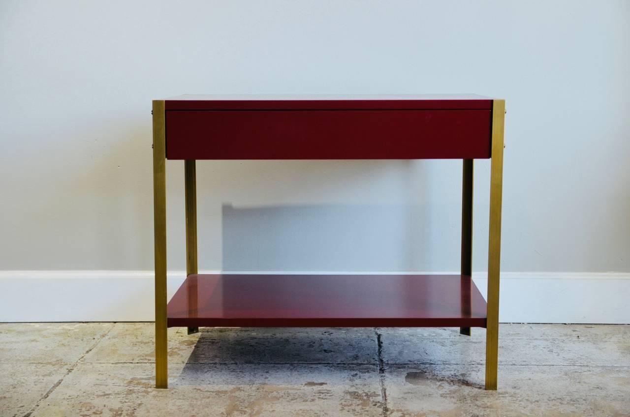 Lacquered Pair of 'Laque' Oxblood Lacquer and Brass Nightstands by Design Frères For Sale