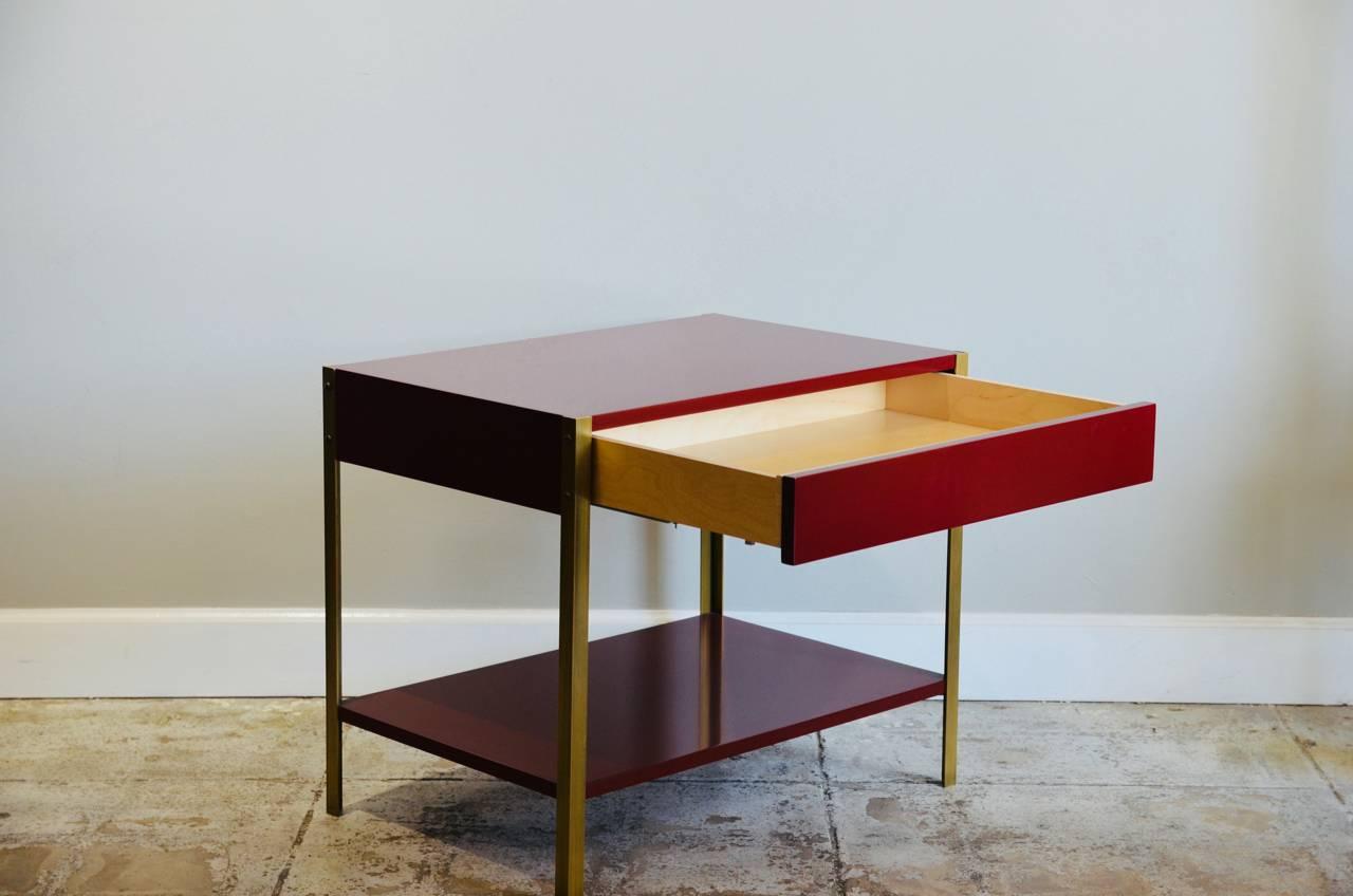 Modern Pair of 'Laque' Oxblood Lacquer and Brass Nightstands by Design Frères For Sale