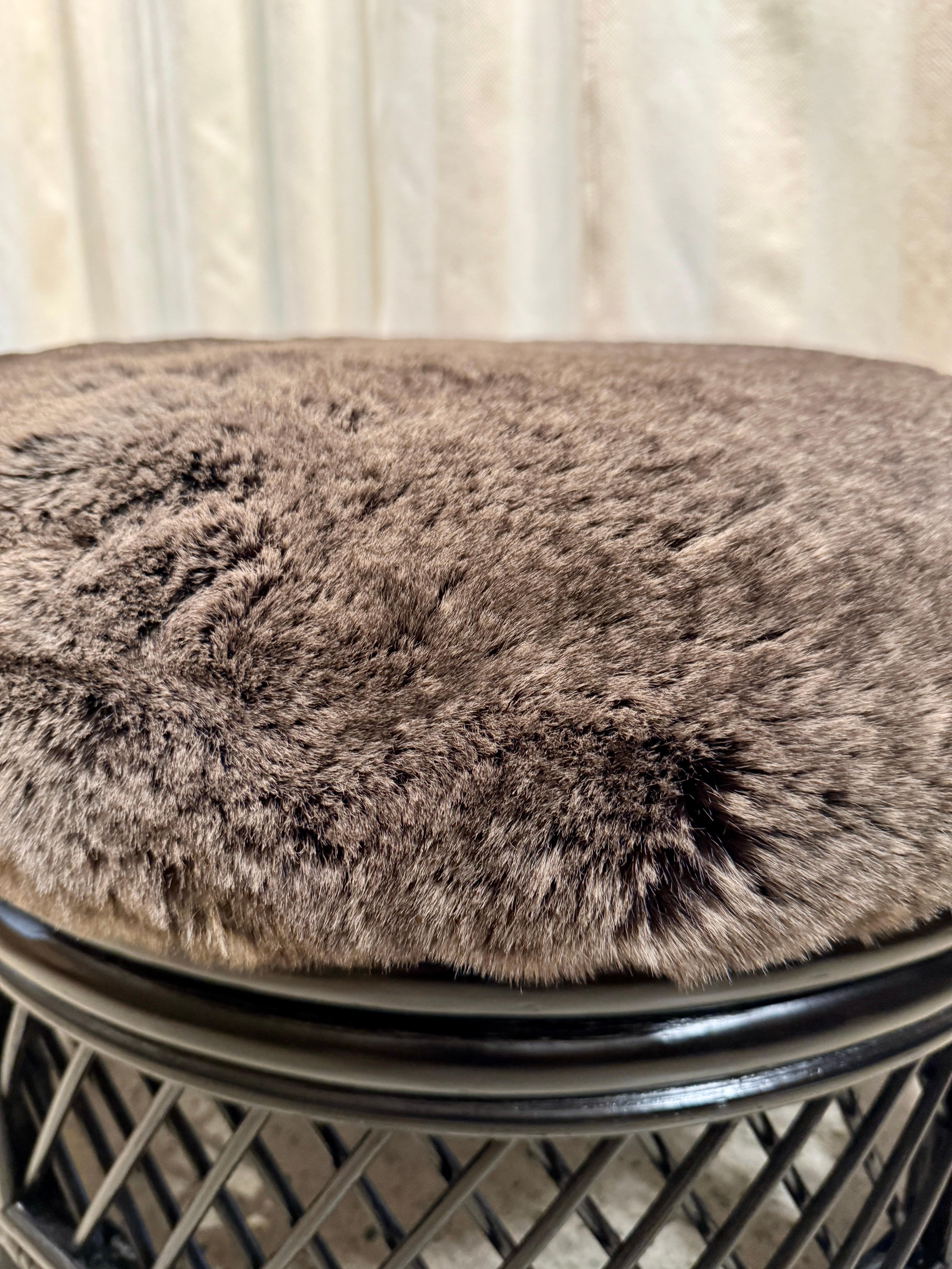 Newly re-lacquered and new seats covered in faux rabbit fur which is super soft and comfy.  Great lattice work throughout and perfect additional seating options.
