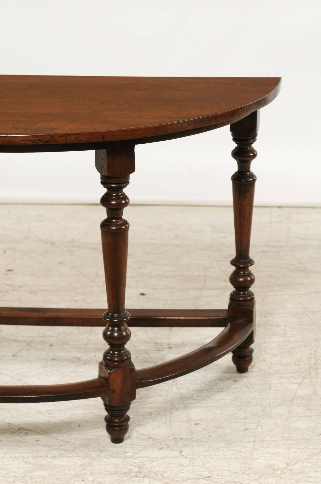 Pair of Large 1820s Italian Walnut Demilune Console Tables with Turned Legs In Good Condition In Atlanta, GA