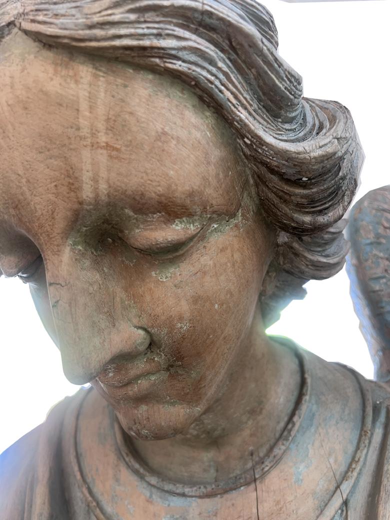 This is a pair of jaw dropping hand carved angles. Each figure is carved with an individual face and pose. Removed from a Church in Europe and brought to the States in the 1990's. They both sit on custom box platforms. they stand almost 7 ft high to