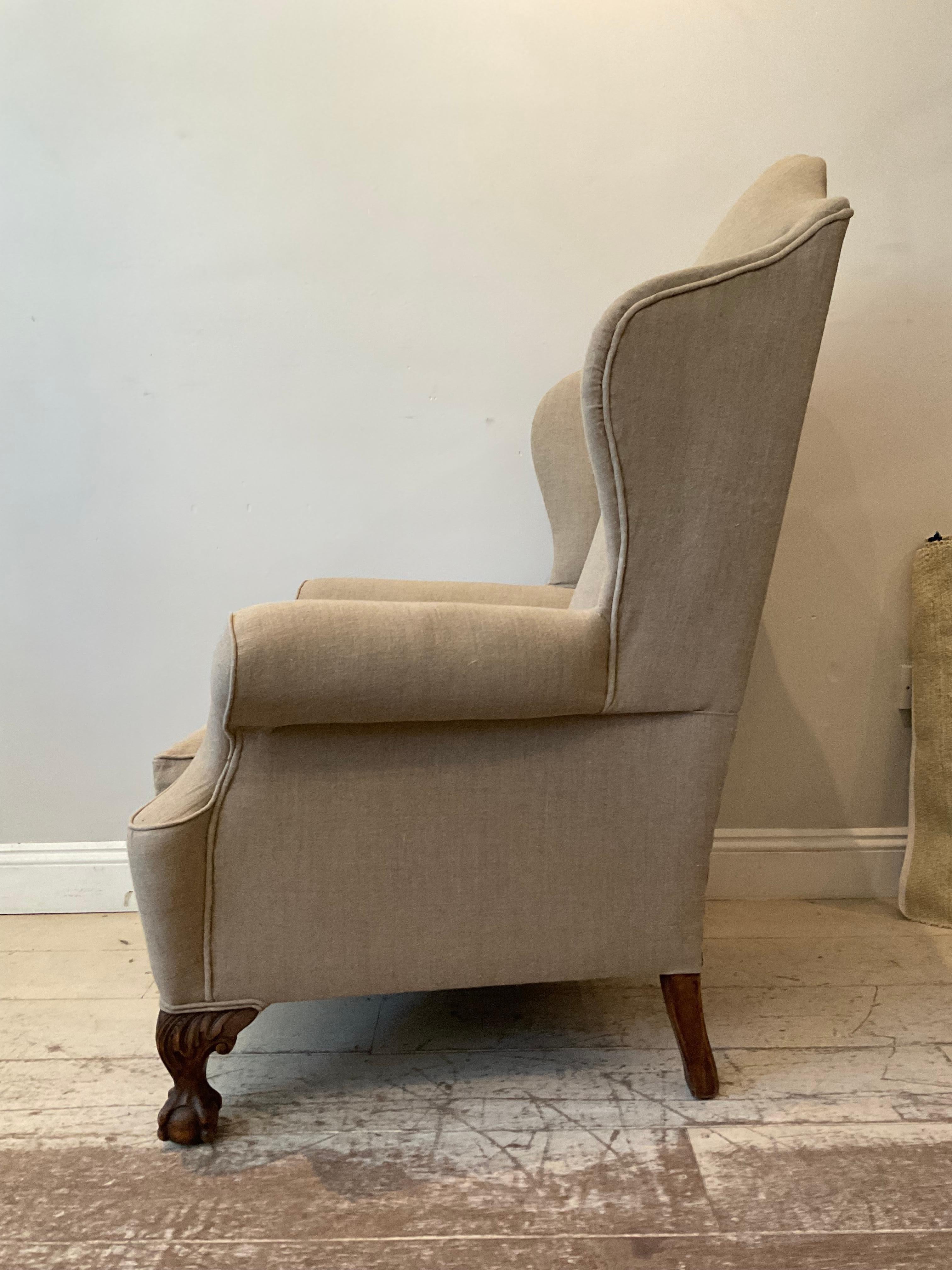 20th Century Pair of Large 1920s English Wing Back Chairs Upholstered in Neutral Linen