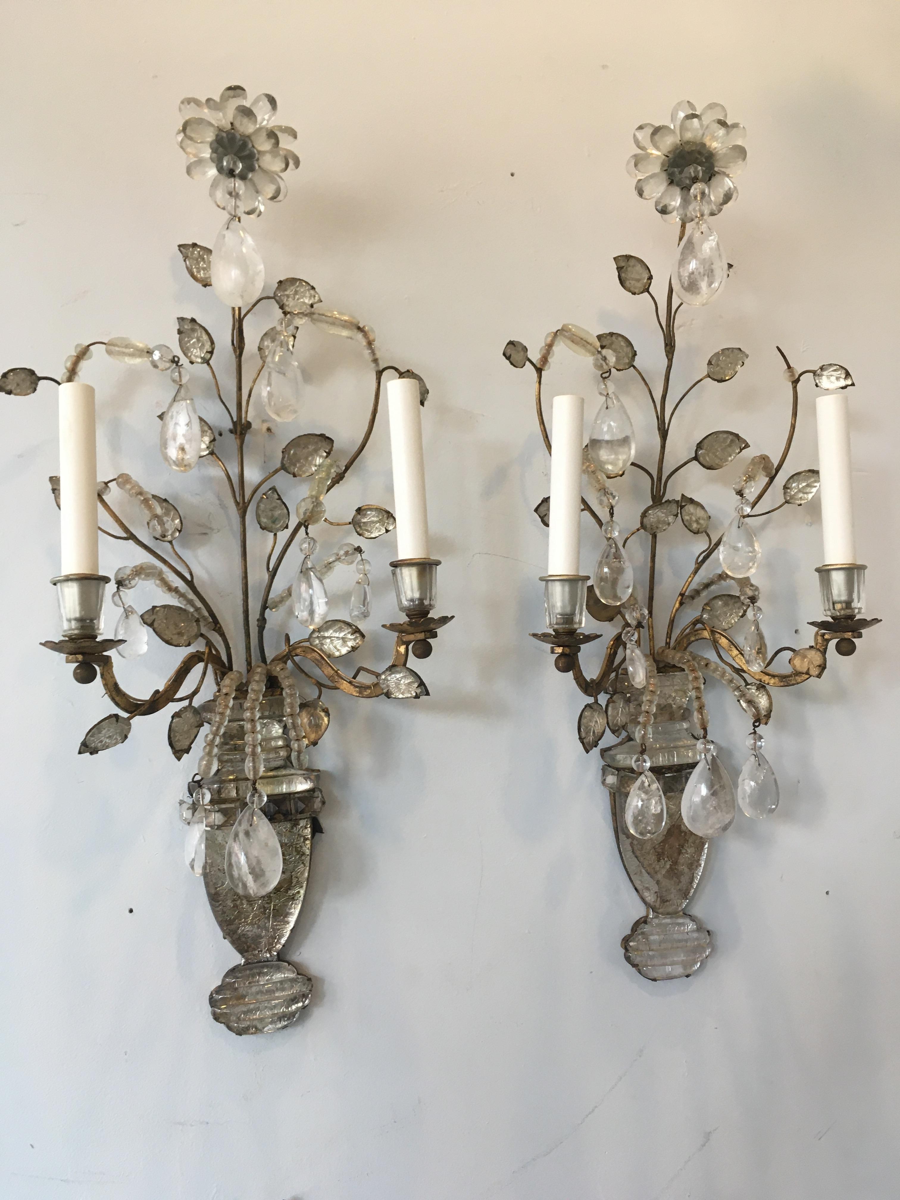 Pair of 1930s Bagues crystal and gilt metal sconces with rock crystal drops.
