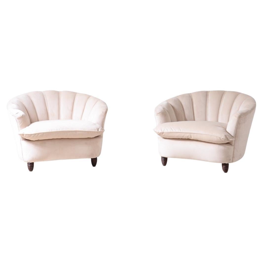 Pareja de grandes sillones en forma de concha de los años 30