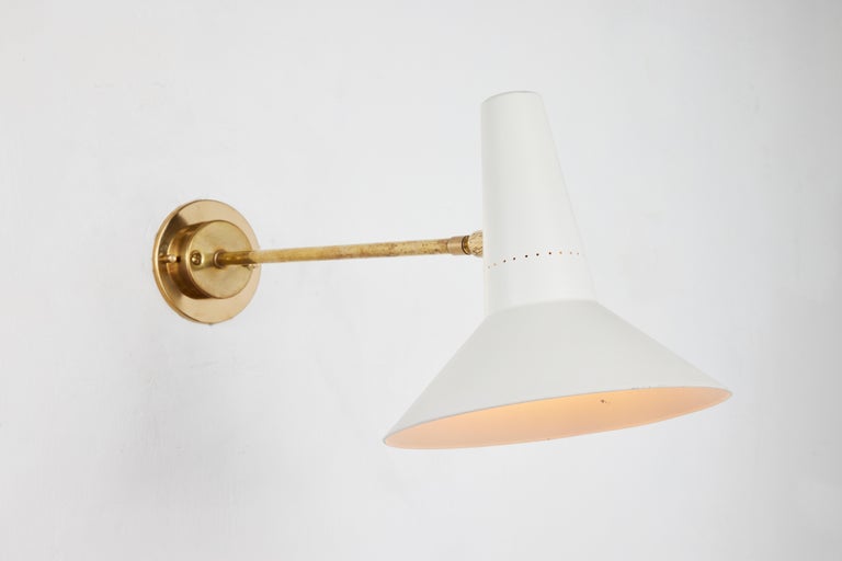 Pair of Large 1950s Giuseppe Ostuni White Articulating Arm Sconces for