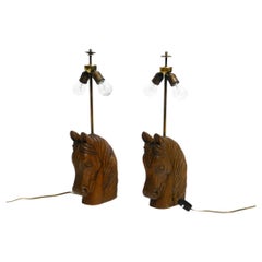 Pair of large 1950s hand carved horse head table lamps made solid stained pine
