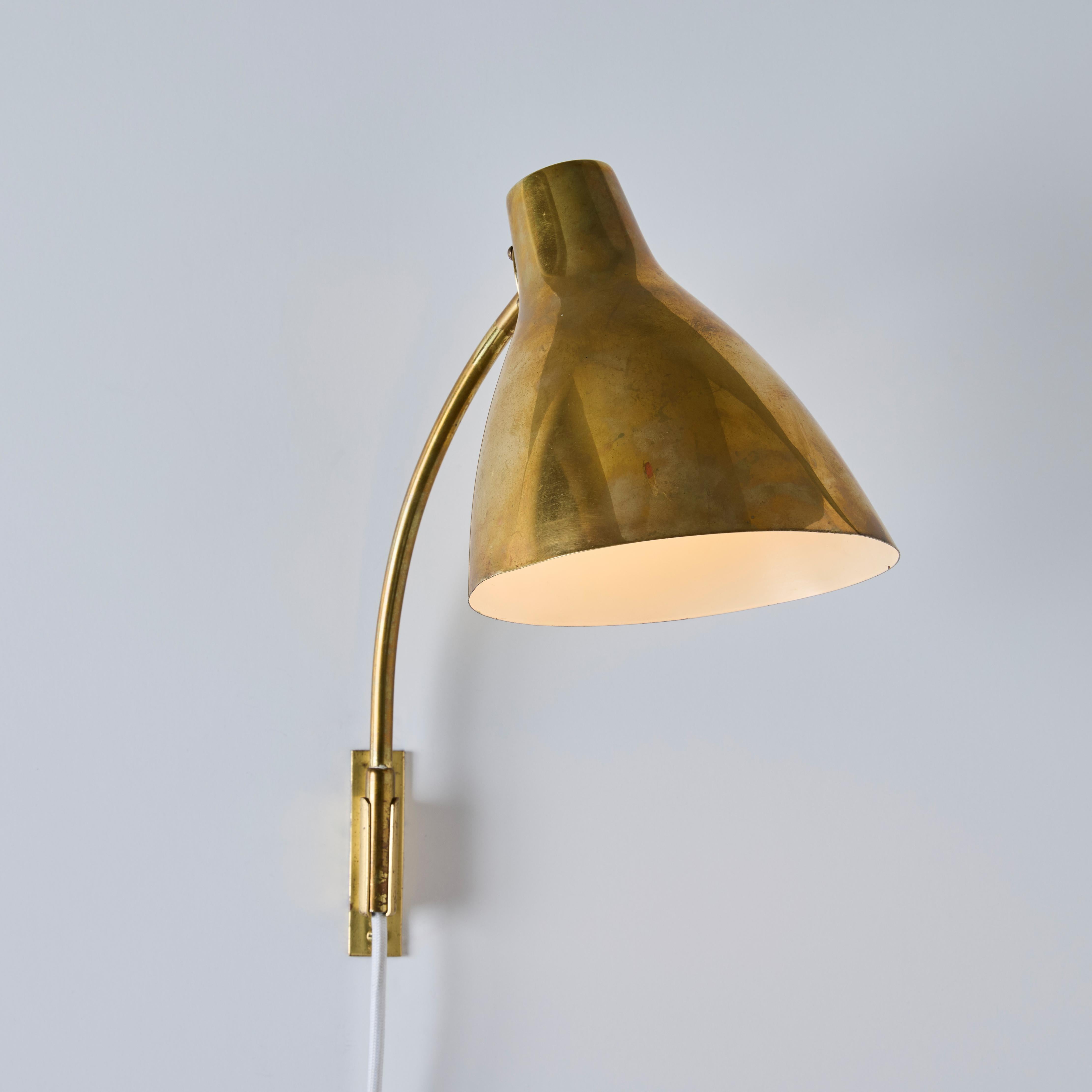 Pair of Large 1950s Lisa Johansson Pape #3055 Brass Wall Lamps for Stockmann In Good Condition For Sale In Glendale, CA