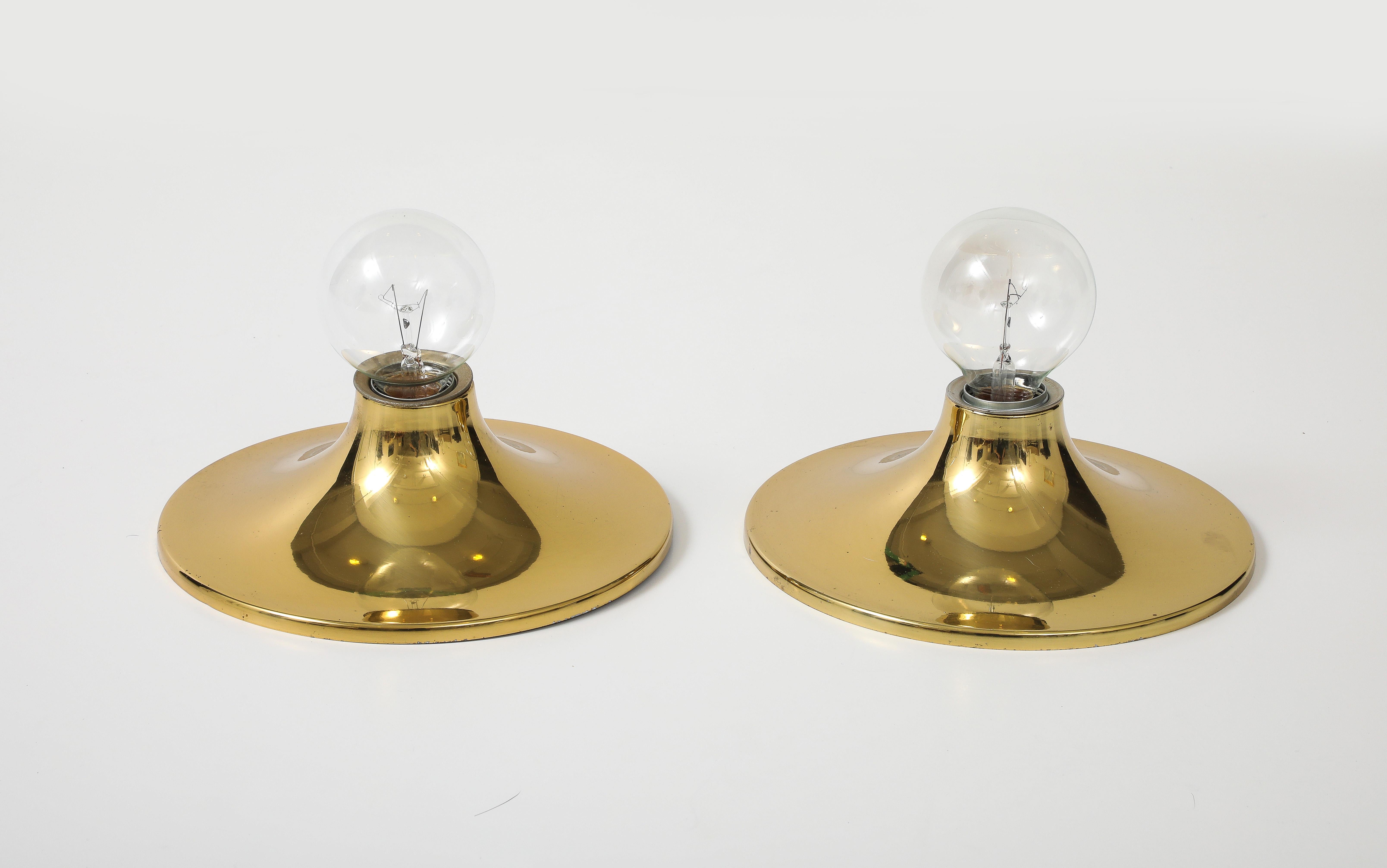 Pair of large 1960's Gold Space Age Wall sconces / ceiling flush mounts by Cosack.
The Golden brass fixture has been Newly rewired for the US and has a single standard light source that takes up to 60 Watts.
The fixtures come complete with Clear