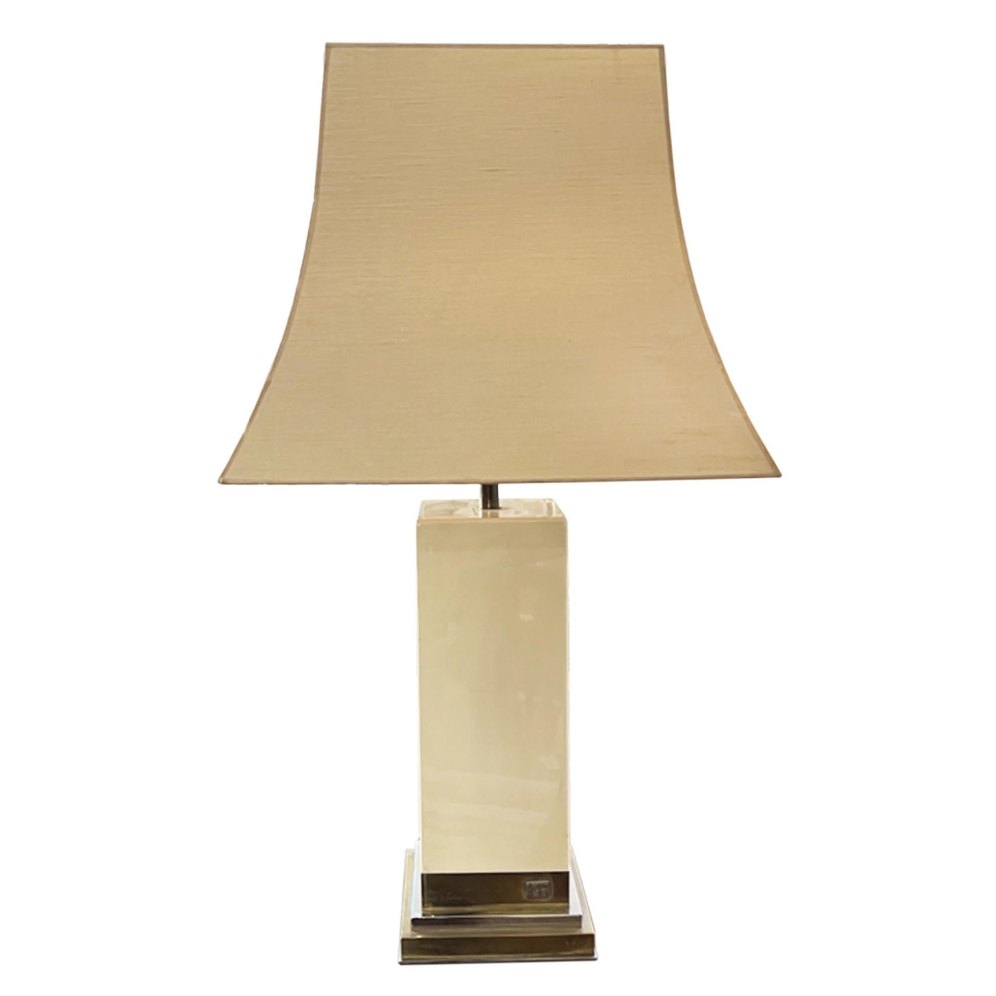 A great pair of very large table lamps by Jean-Claude Mahey in the 1970s.

Please take a look at all our pictures to get a closer look at the stylish design and maker's stamp. 

We are selling these lamps with the original shades which match the