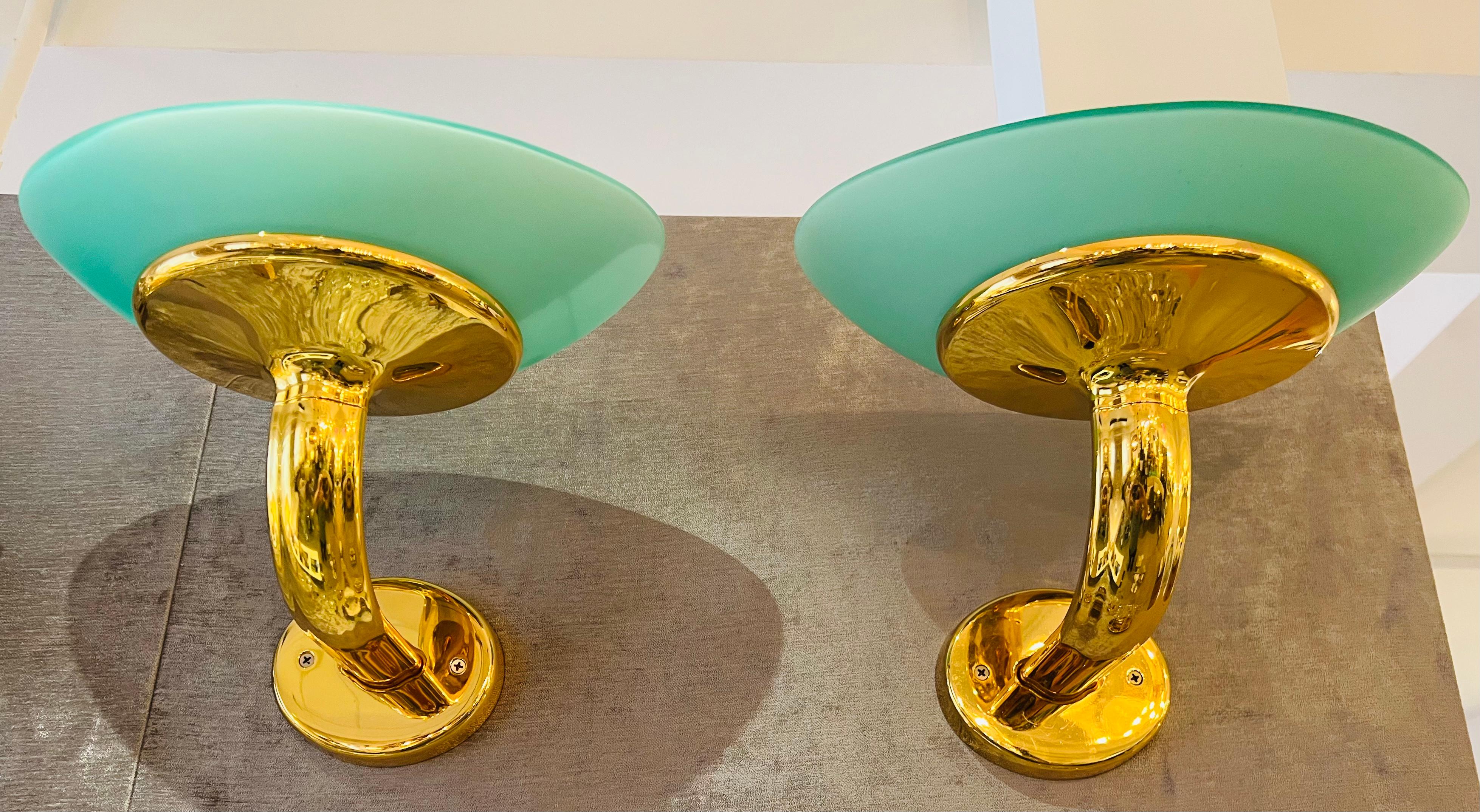 A pair of large gold plated luxurious 1980s wall lamps with green sea foam elliptical glass shades by Fratelli Martini. Great condition.