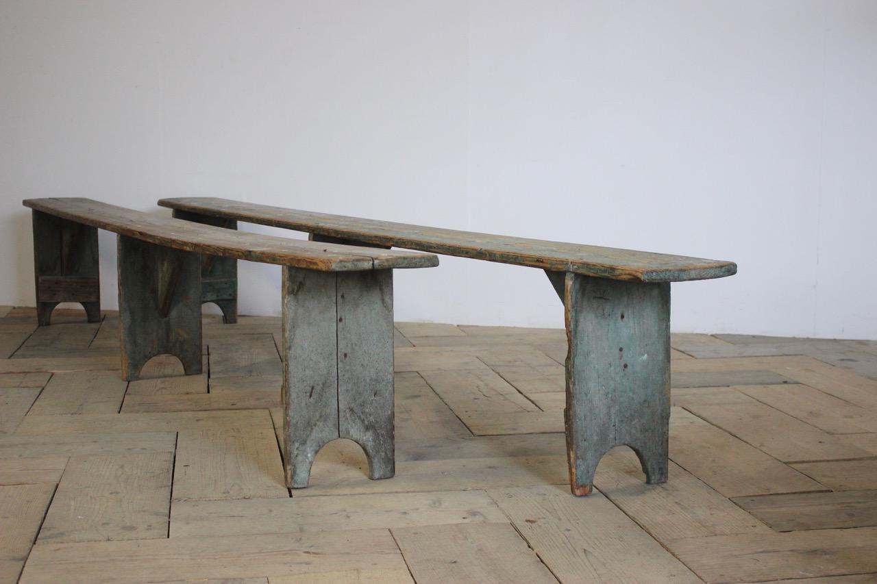 A wonderful pair of 19th century large painted benches in pine, retaining the original paint, with a lovely patina and underneath with the inscription Bar Le Duc next to a crest,
Sweden.
 