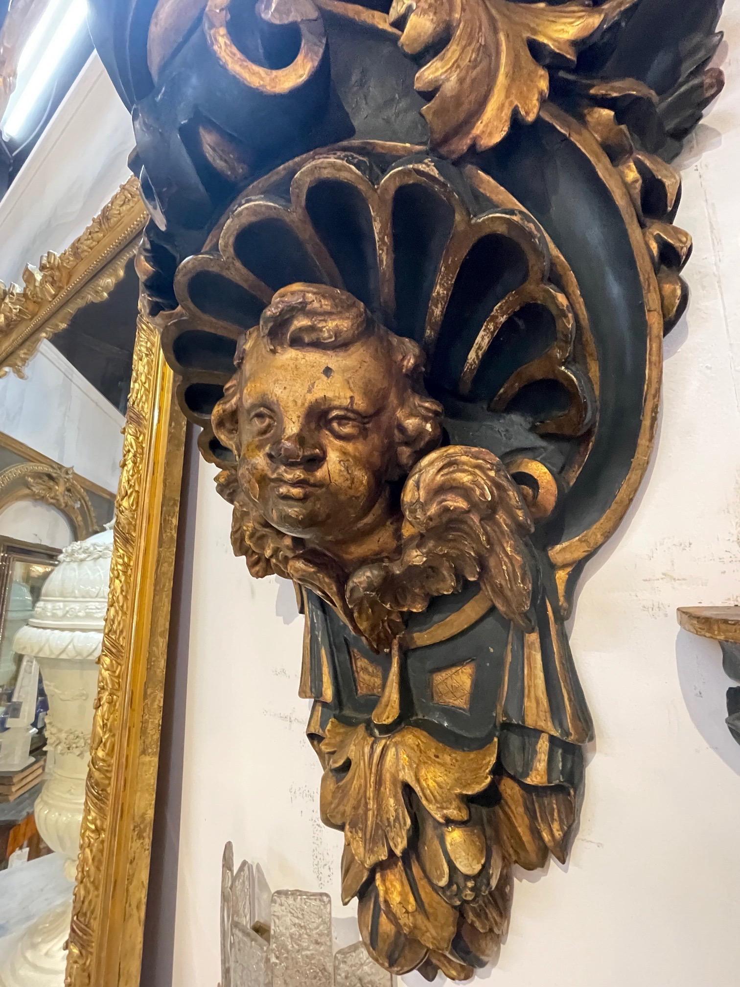 Wood Pair of Large 19th Century Carved and Parcel Gilt Cherub Wall Brackets