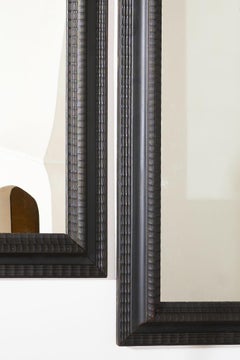 Pair of large 19th Century Ebonised Italian wall mirrors