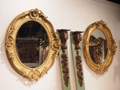 Pair of Large 19th Century Louis XV Style Oval Giltwood Mirrors from France