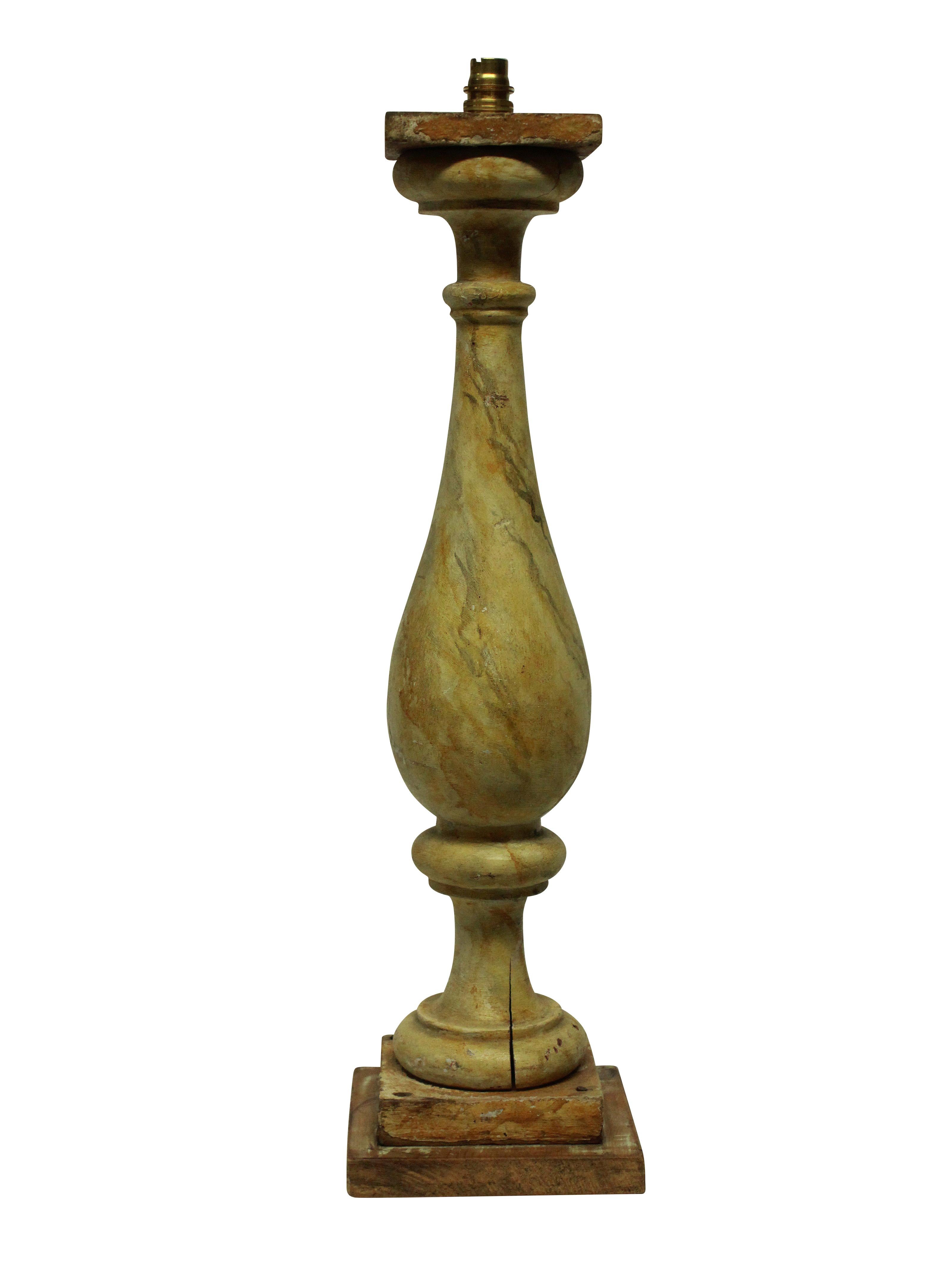A pair of large English carved wood balustrade lamps, decorated in faux Sienna marble.