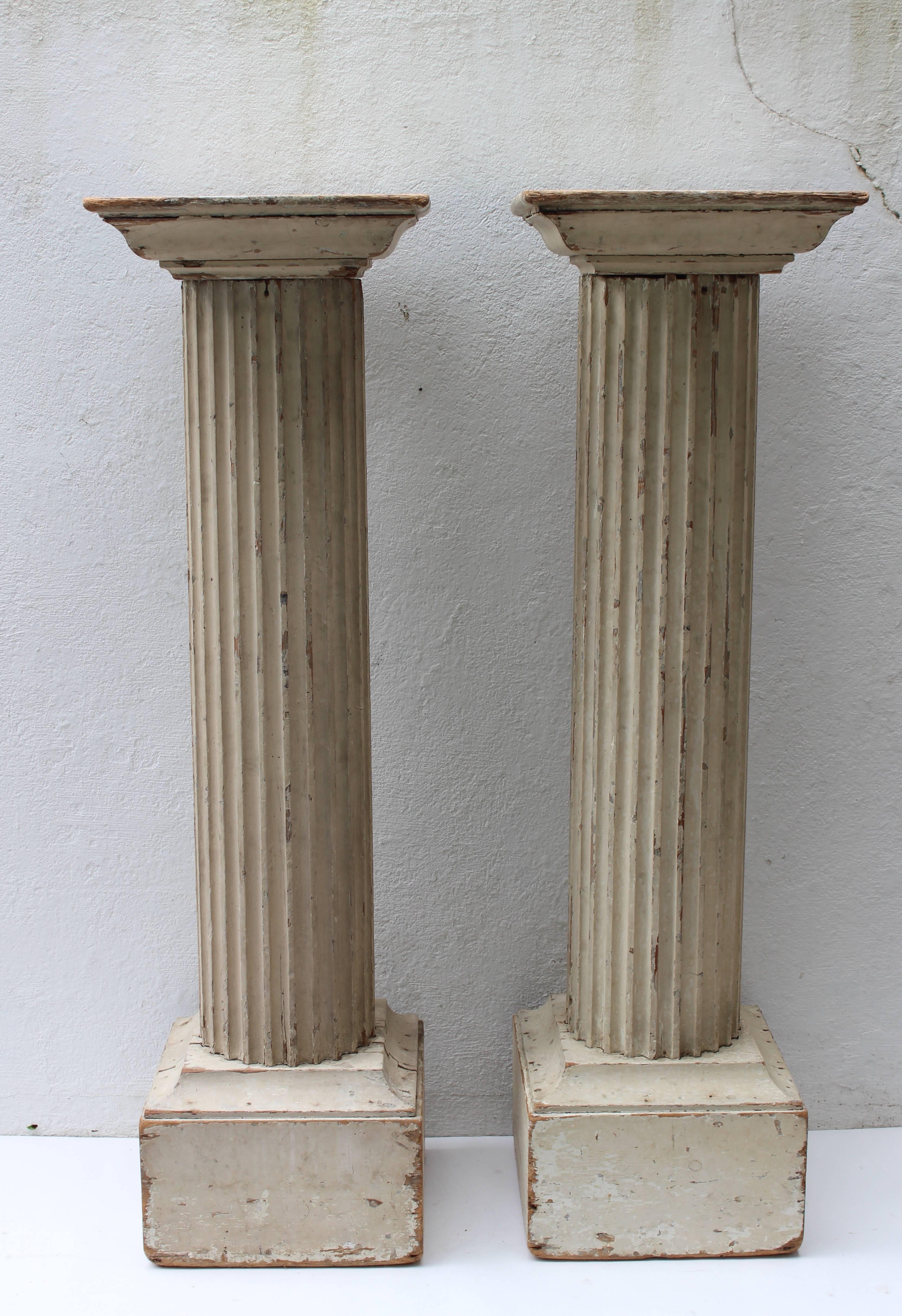Pair of large 19th century painted Doric columns.
Measure: Top of each column measures 16.5