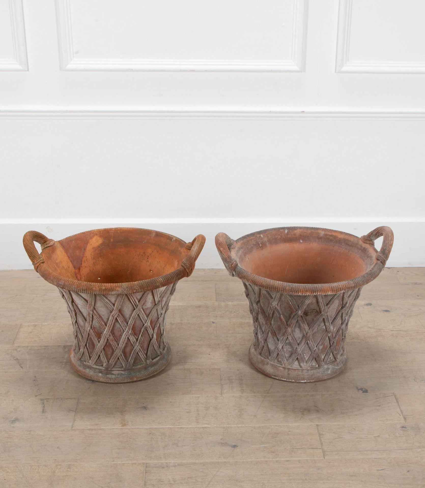 A very rare, large pair of 19th century terracotta basket garden urns.
By John Mathews, Royal Pottery, Weston Super Mare.
In good condition, one with restoration, both fully stamped.
England, Circa 1880.