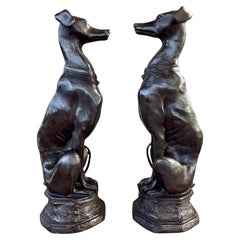 Pair of large 20th Century Art Deco revival bronze seated Greyhounds / Whippets