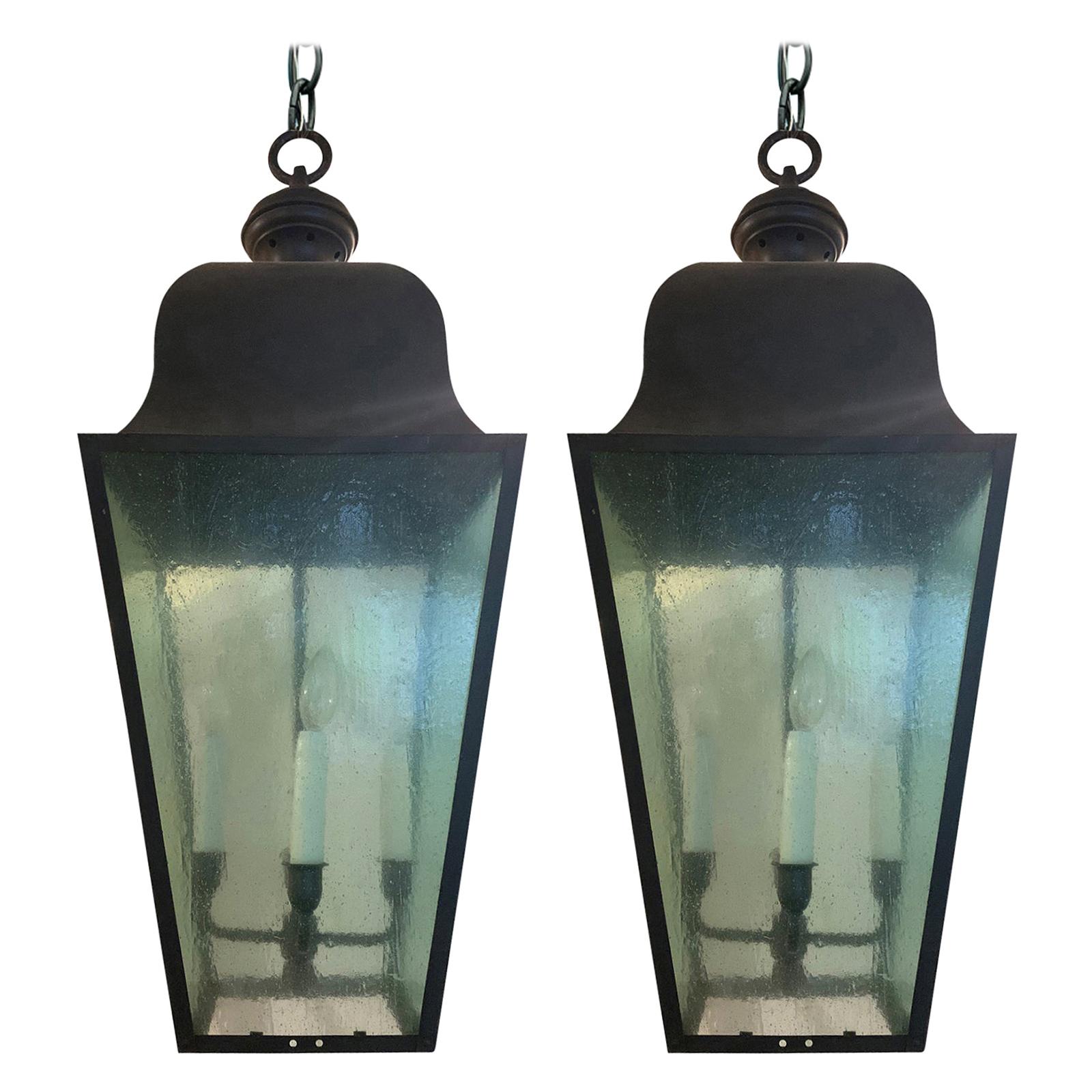 Pair of Large 20th Century Black Iron Four-Light Lanterns with Tinted Glass
