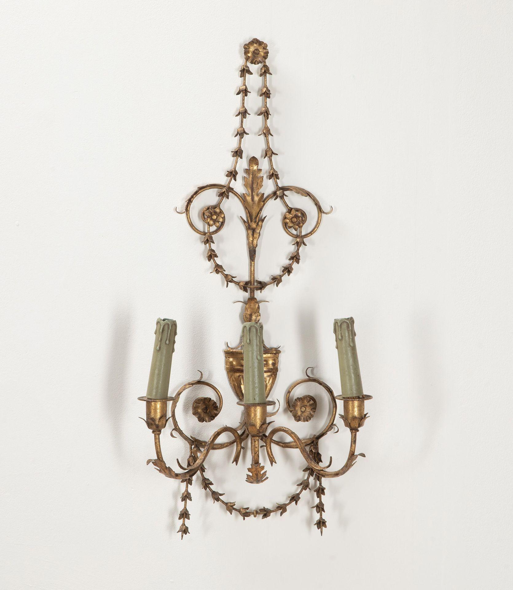 A pair of large 20th Century English beautiful tole wall sconces. 
In good condition with softly gilded finish and original pale green candle holders, an elegant classical design.
These have old wiring but are currently for candle use - rewiring can