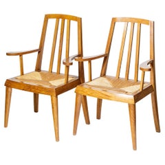 Paire de grands fauteuils ou chaises de salle à manger en bois et paille du 20ème siècle vers 1960