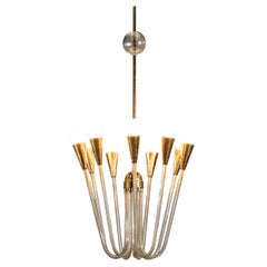 Pair of large 60's glass and brass chandeliers