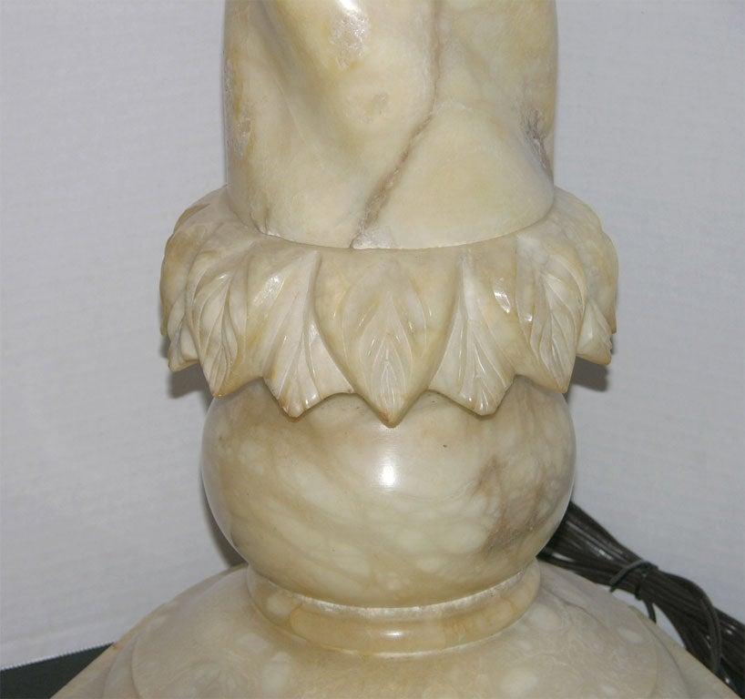 Pair of large circa 1930's Italian hand-carved alabaster columns mounted as lamps.

Measurements:
Height: 24