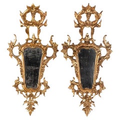 Pair of large and elaborate European Antique Giltwood Cornucopia Mirrors