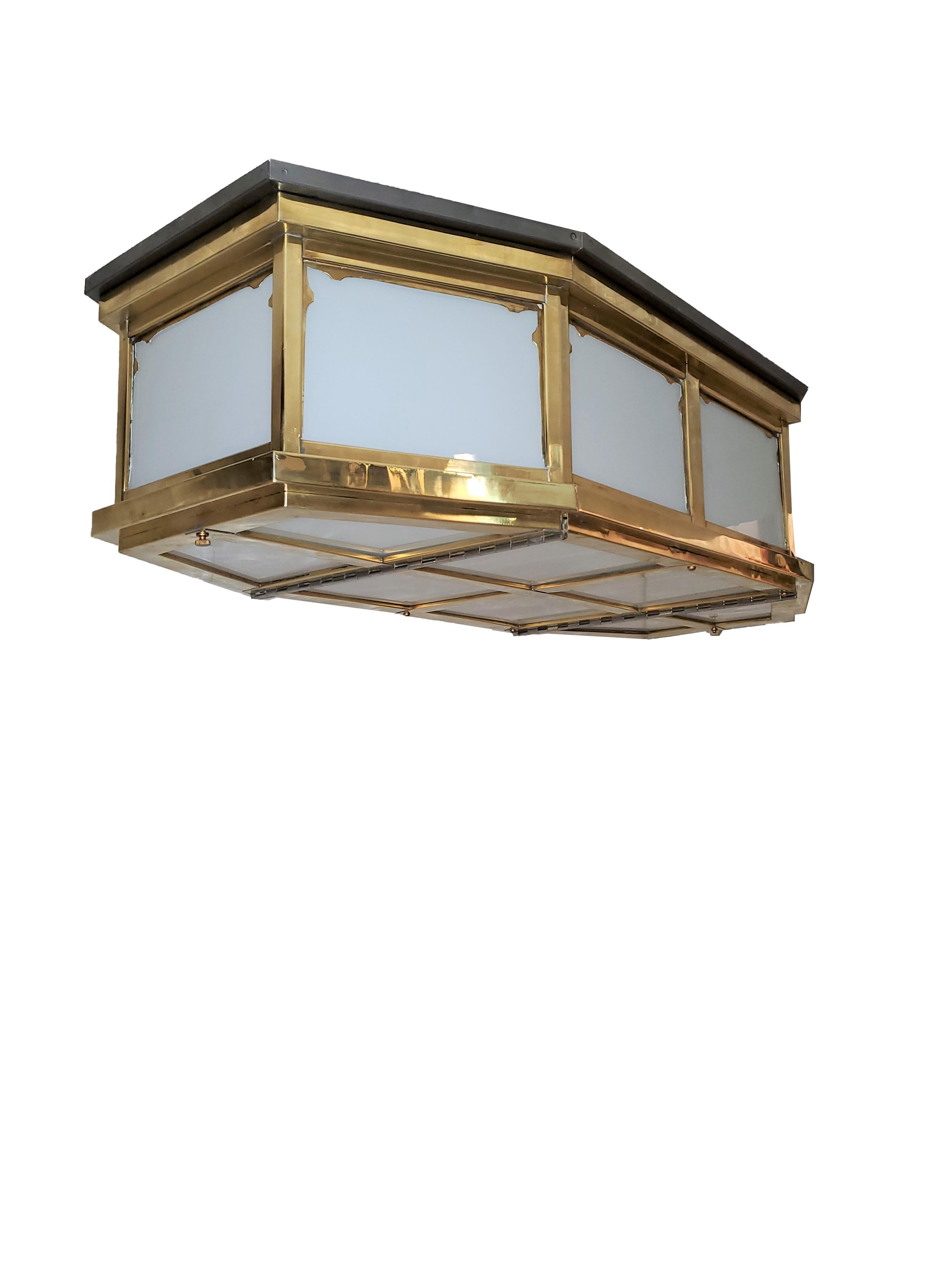 Pair of Large and Long Mid-Century Modern Brass and Glass Flush Mounted Fixtures In Good Condition For Sale In New York City, NY