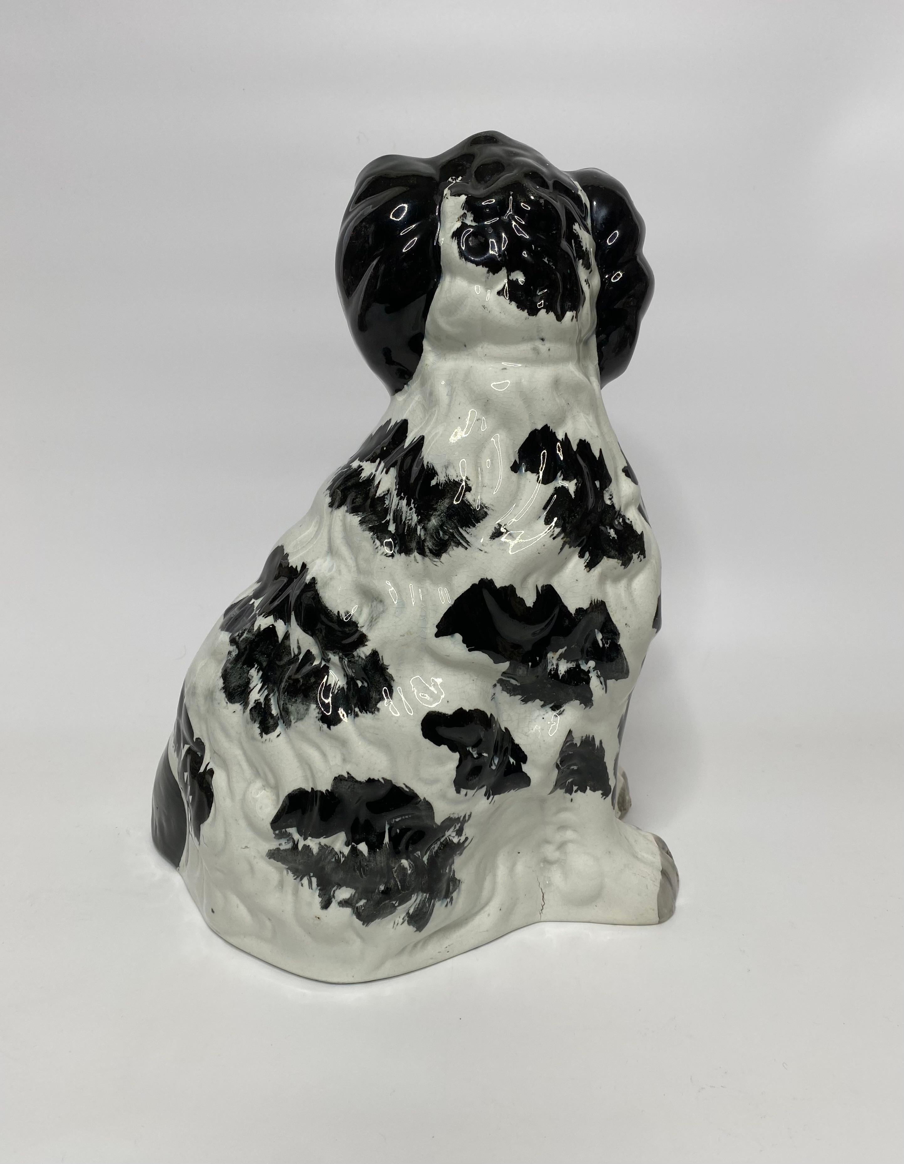 Pair of large and rare Staffordshire Spaniels, c. 1840. 1