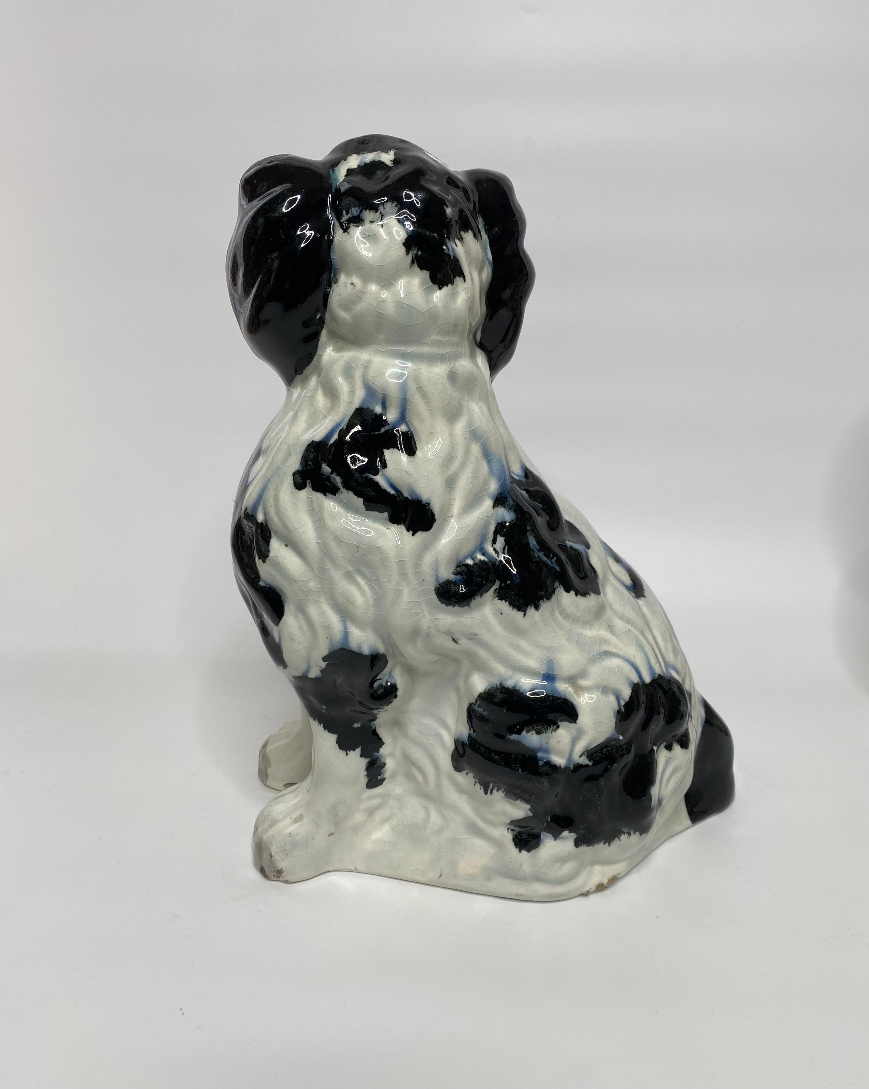 English Pair of large and rare Staffordshire Spaniels, c. 1840.