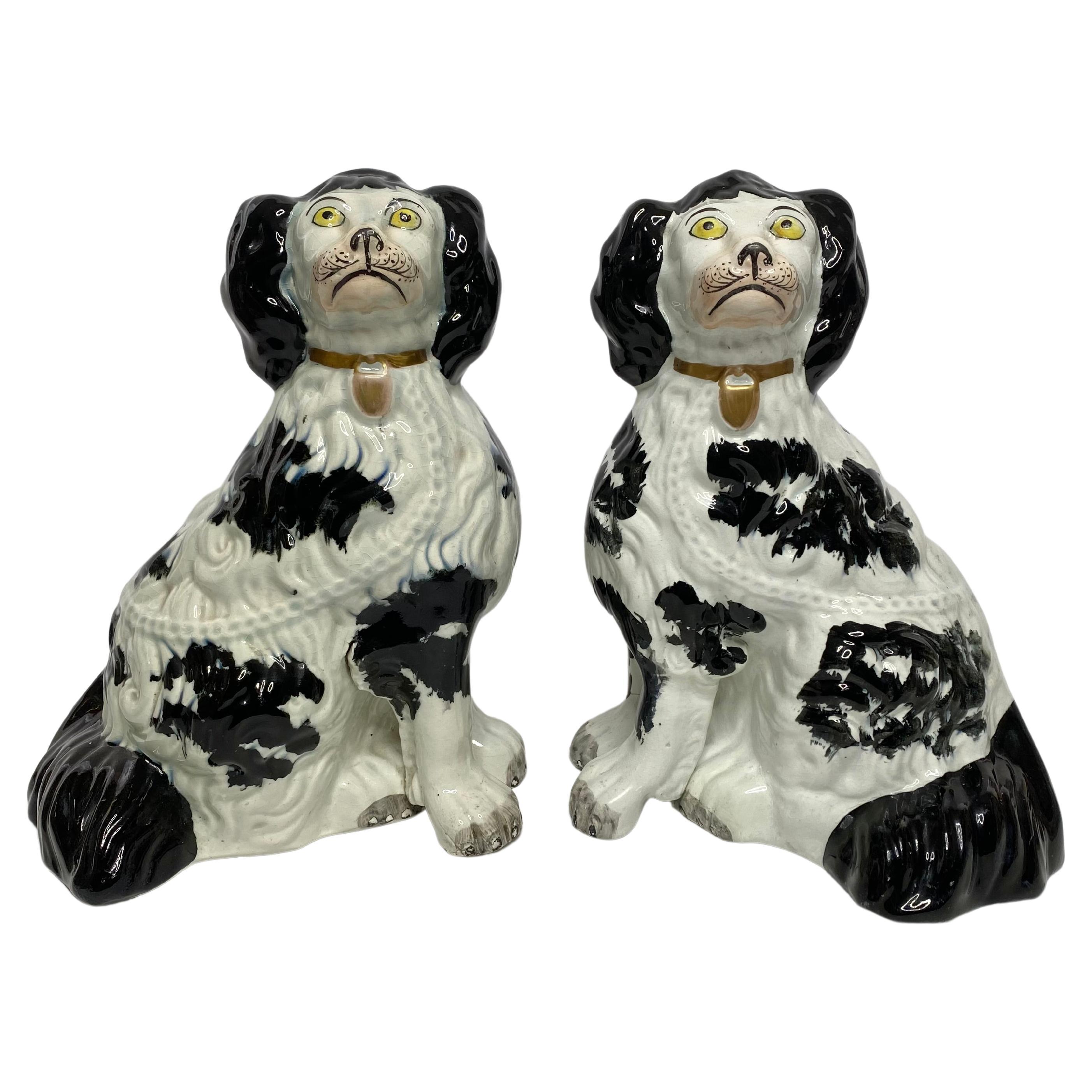 Pair of large and rare Staffordshire Spaniels, c. 1840.