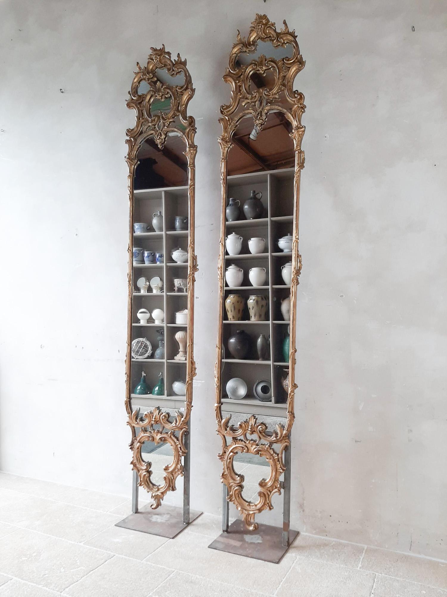 Mercury Glass Pair of Large and Richly Ornamented Antique French Gilt Pier Mirrors