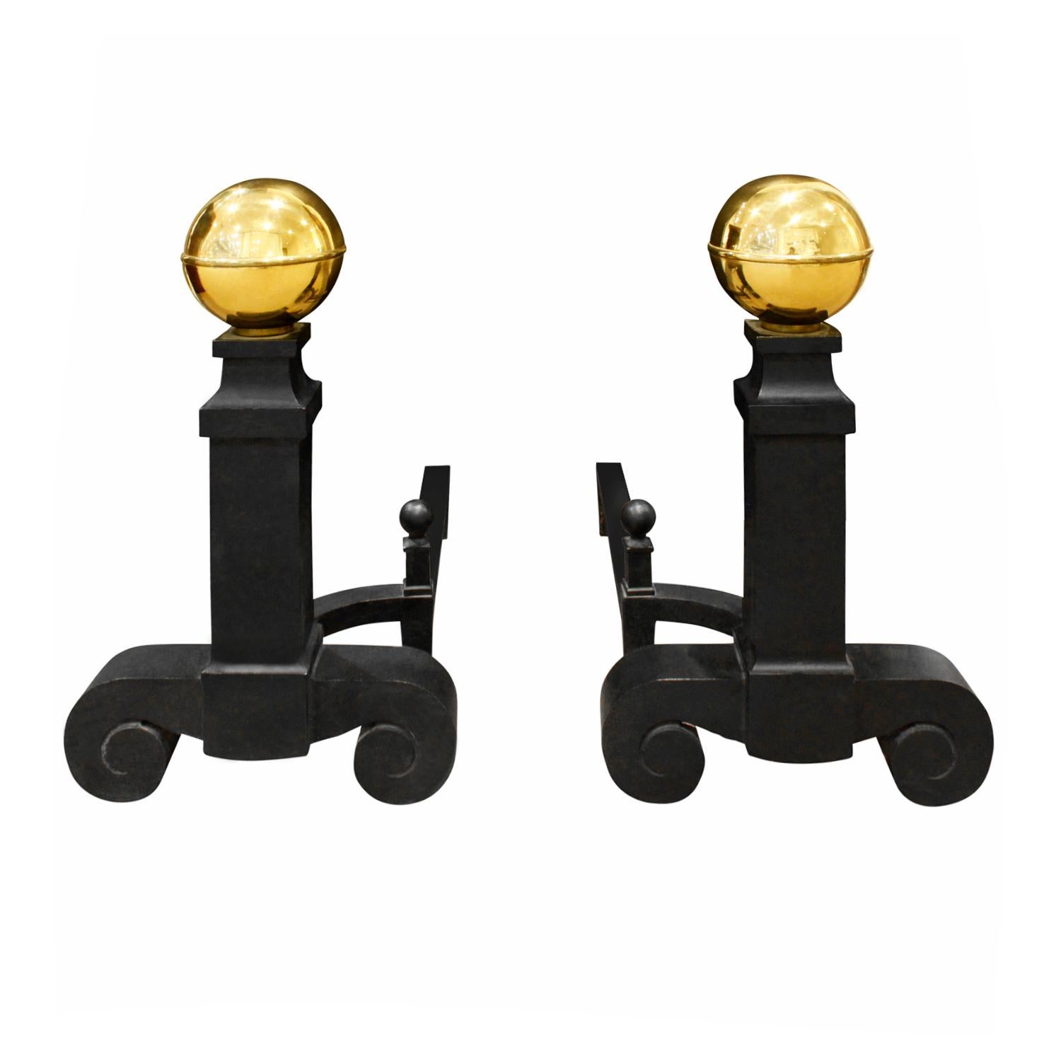 Pair of large andirons in wrought iron with brass orbs on top by Stover, American 1970's (signed “STOVER MFG. CO.” on base of andiron).   These andirons are beautifully made. Dimensions are for each.