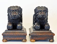 Pair of Large Anglo-Indian Carved Lions Couchant on Molded Bases, circa 1920