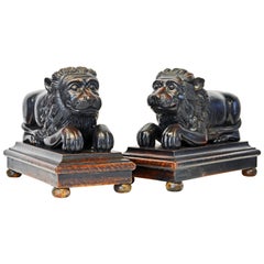 Antique Pair of Large Anglo-Indian Carved Lions Couchant on Molded Bases, circa 1920
