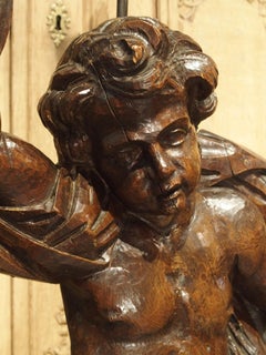 Paire de grandes statues ou lampes de Putti sculptées en Italie:: 18ème siècle