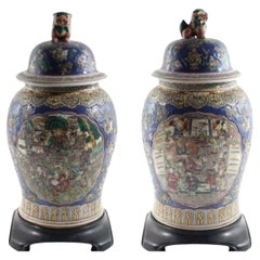 Pair of Large Antique Chinese Porcelain Urns with Lion Lid and Wood Stand