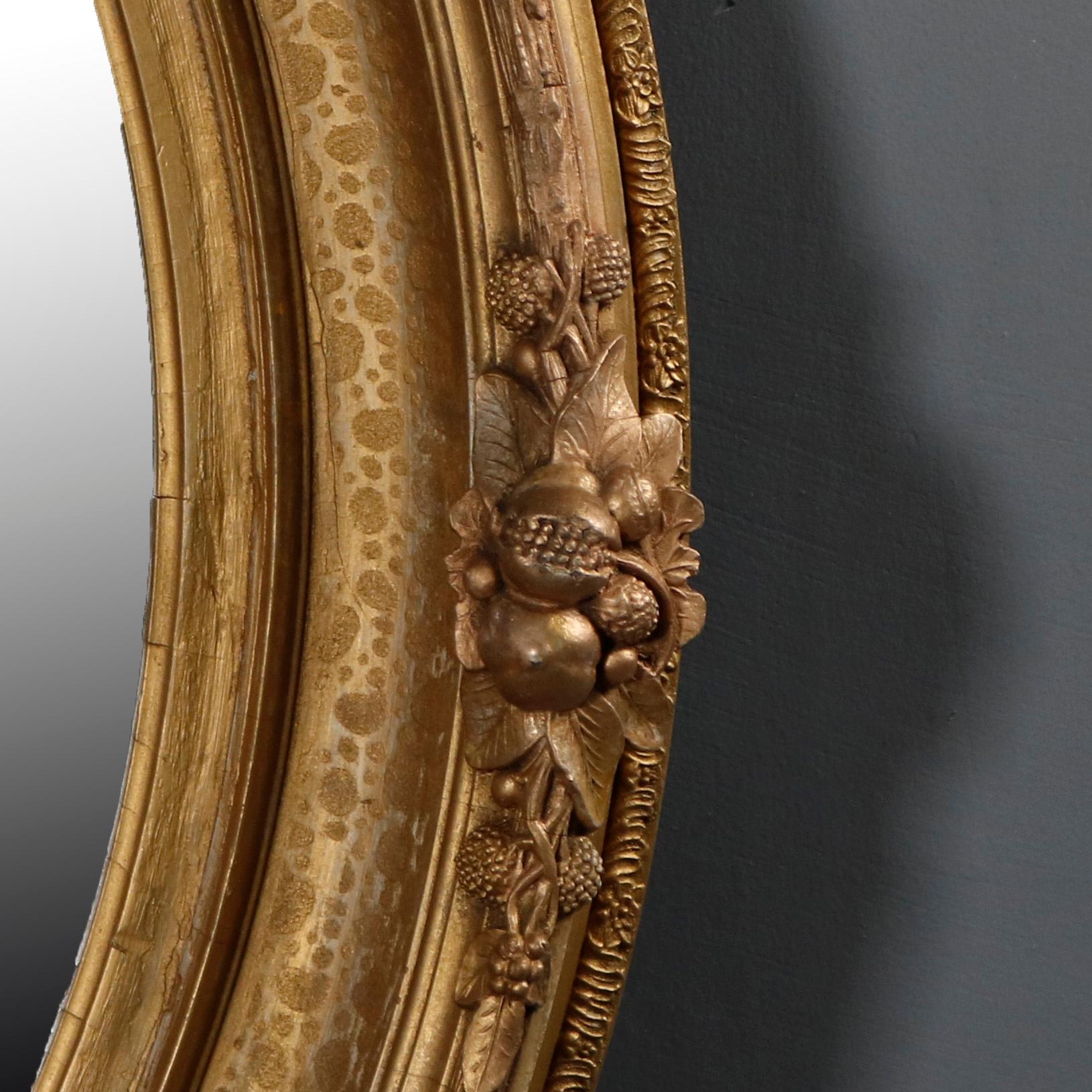19th Century Pair of Large and Antique French Louis XIV Floral Giltwood Oval Wall Mirrors